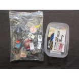 A quantity of keyrings and badges mainly relating to vehicles