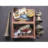 A wooden box containing hunting horn, military style buttons, napkin rings, etc