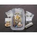 A PVC box containing a quantity of costume jewellery to include bracelets, necklaces, etc