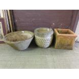 Three garden pots, lack plants