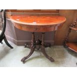 A late 19th century burr walnut card table, the fold over top supported on swivel action on four