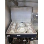 A boxed Aynsley coffee set 'Wild Tudor'