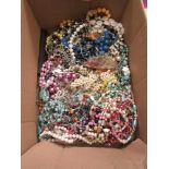 A box containing a quantity of costume jewellery