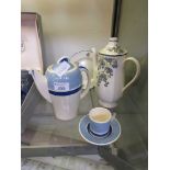 A Suzie Cooper coffee pot together with cup and saucer, along with a Royal Doulton 'Carnival'