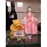 A Royal Doulton Winnie The Pooh figure together with a Royal Doulton 'Bo Peep' figure HN1811