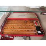 An early 20th century Barretts silent salesman price ticket hand printing set