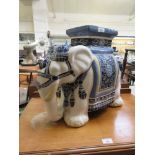 A ceramic glazed garden seat in the form of an elephant