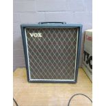 A solid state Vox, model T-15, 1x8 bass amplifierSpeaker model 200RFB20-5. Speaker 20 watts,