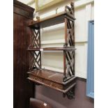 A set of 18th century style mahogany wall hanging shelves