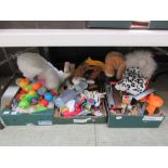 Three trays of children's toys to include race sets, soft toys etc.