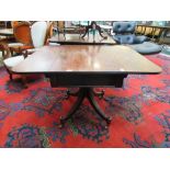 An early 19th century mahogany Pembroke table, the drop-leaf top over two end drawers on a turned