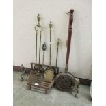 A cast iron fire grate along with a chestnut roaster, companion set, fire irons etc.