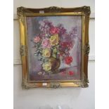 An ornate gilt framed oil on canvas of still life signed bottom right