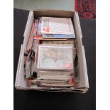 A box containing a quantity of trade cards relating to football, etc