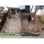 Two trays of glassware to include bowls, drinking vessels, decanters, etc