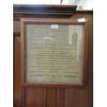 A framed and glazed sampler by Mary Ann Brown dated 1936