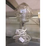 A cut glass table lamp