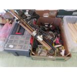 A selection of fishing rods, reels and other fishing accessories