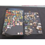 A folio containing a quantity of brooches and badges, mainly of elephants