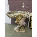 A moulded garden bird bath with figural column