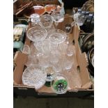 A tray of assorted glassware to include drinking vessels, candlesticks, etc