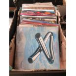 A tray containing a quantity of records to include Mike Oldfield, Steely Dan, Van Macoy etc.