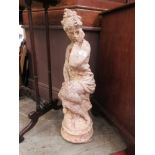 a composite stone garden ornament in the form of a thoughtful lady
