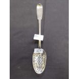 A white metal pierced basting spoon