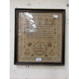 A framed and glazed sampler Elizabeth Morley aged 10 years
