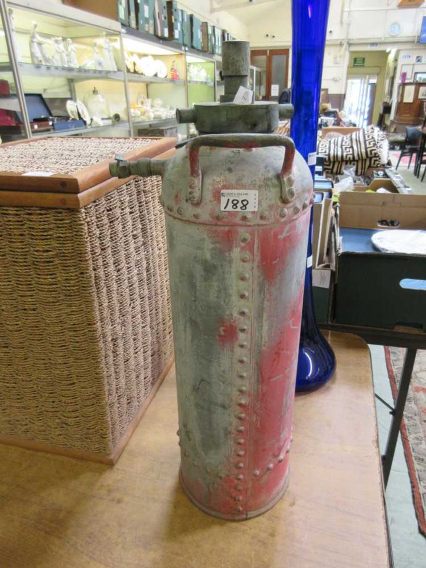 An early 20th century fire extinguisher