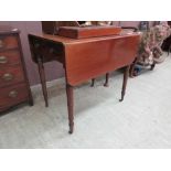 A 19th century mahogany Pembroke table, the drop-leaf top over single end drawer on turned legs