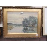 A framed and glazed watercolour of lake scene signed R W Fraser 'St Ives'