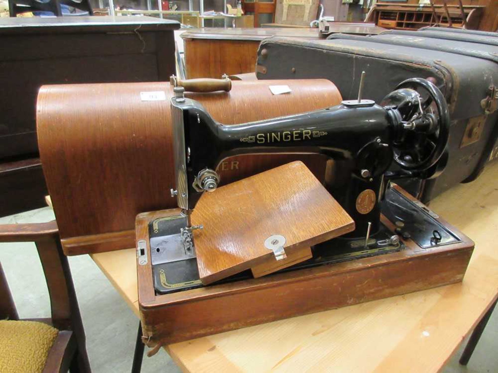 A dome case Singer manual sewing machine