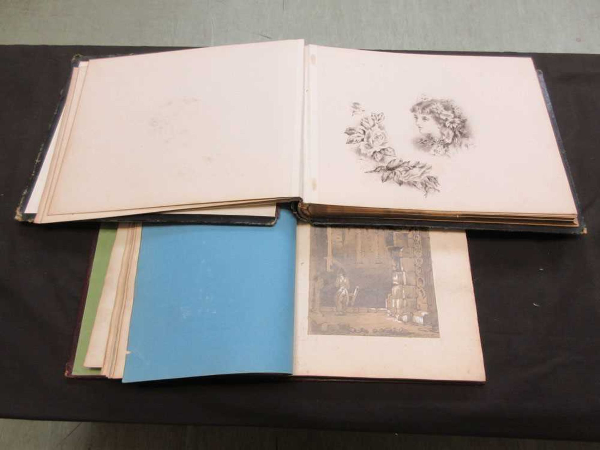 A late Victorian leather bound album containing a selection of watercolours together with one