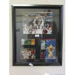 A framed and glazed display of the Rugby World Cup 2003 with a facsimile signed photograph of Martin