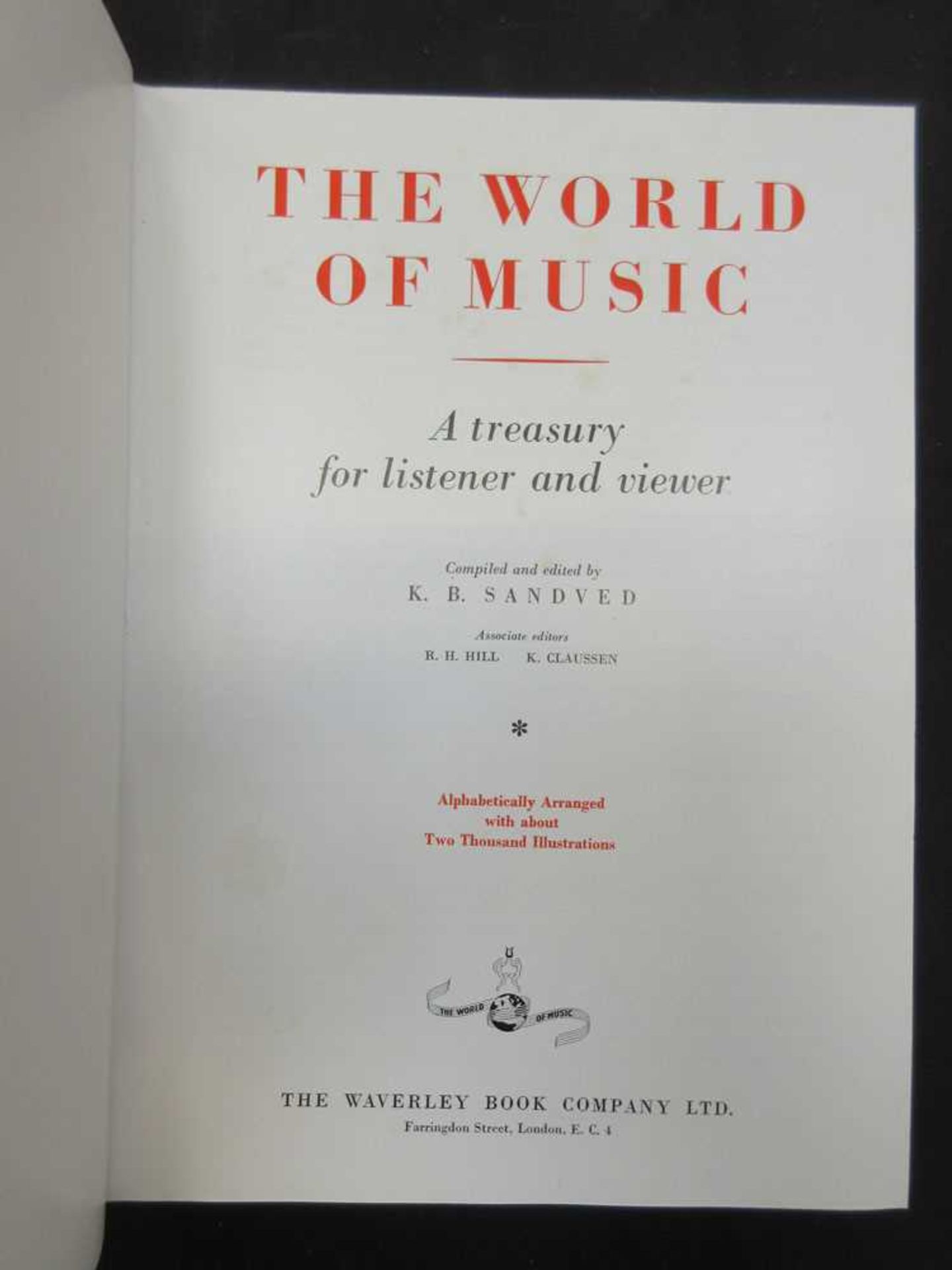 A boxed wooden bound copy of 'The World Of Music'