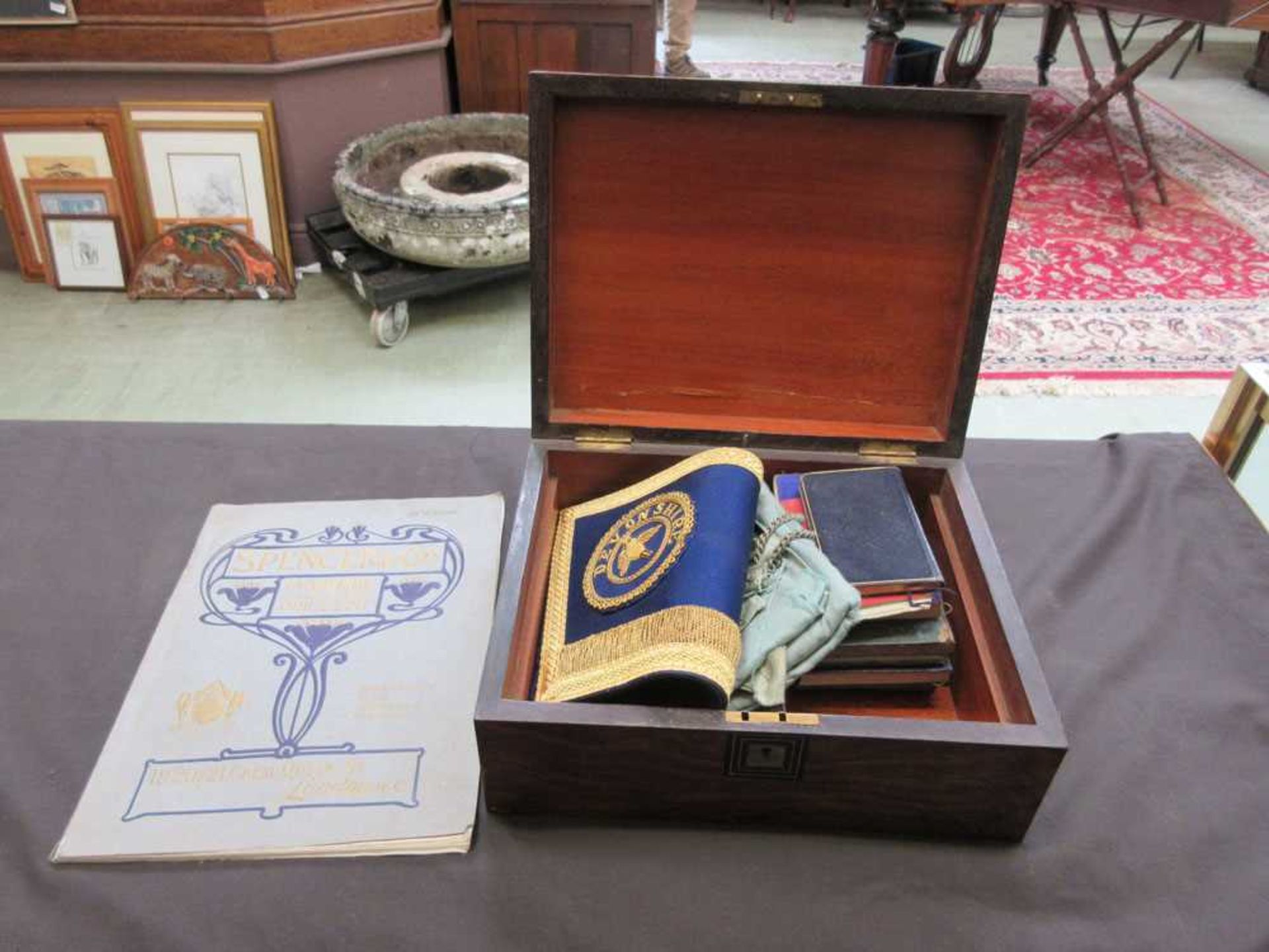 A Victorian rosewood workbox containing a quantity of masonic memorabilia to include books, bib,