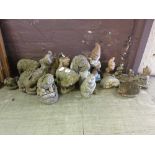 A group of small composite stone ornaments to include elephants, squirrels etc.