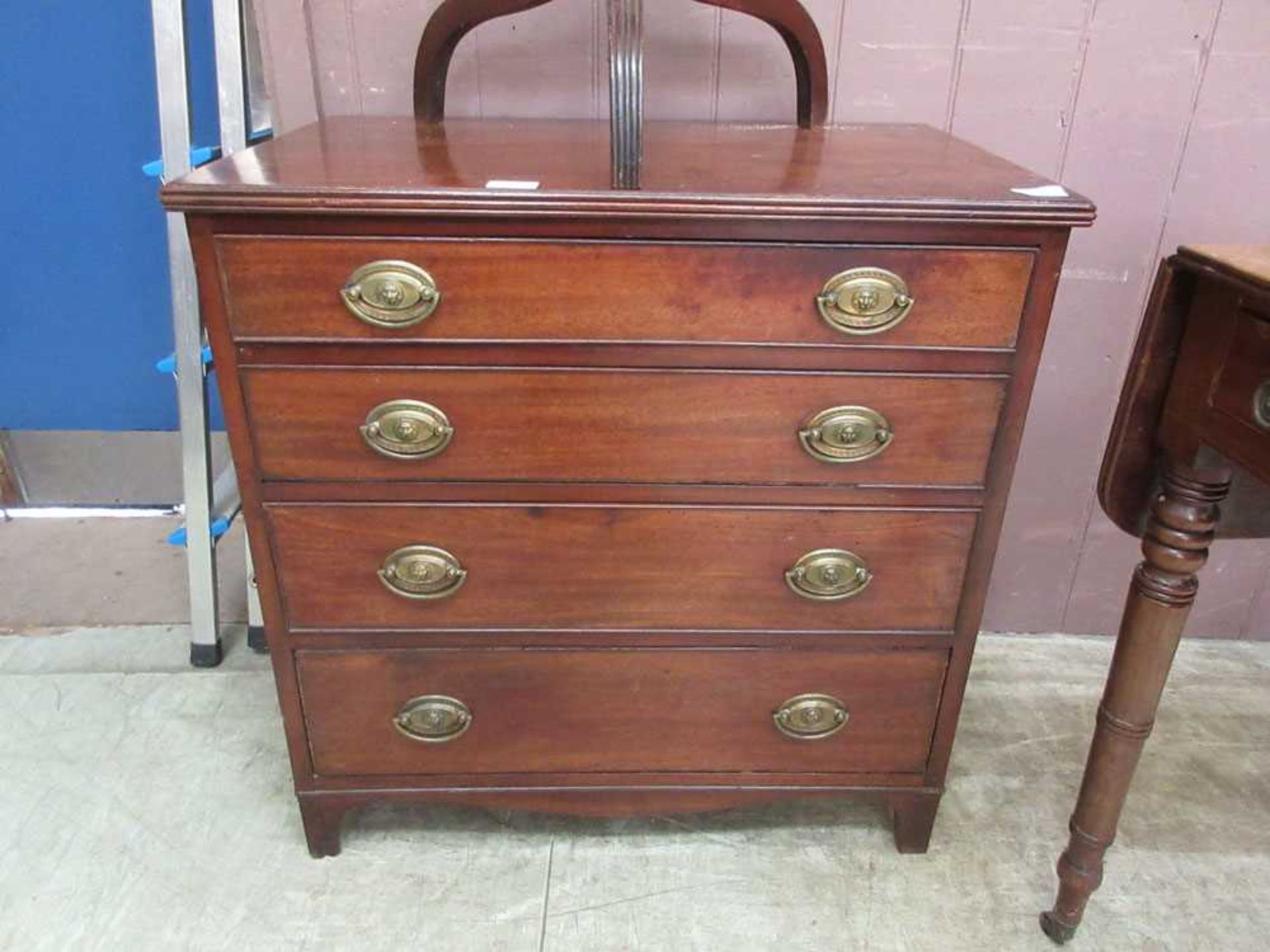 An early 20th century mahogany chest of four drawers