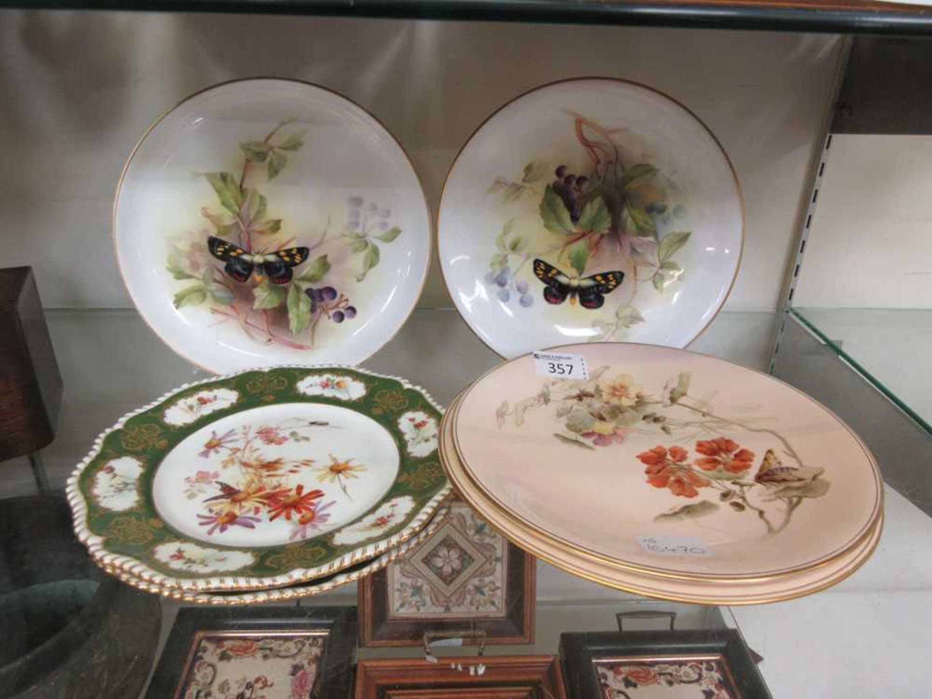 A collection of six Royal Worcester decorative plates, two with bird design, two with floral design,