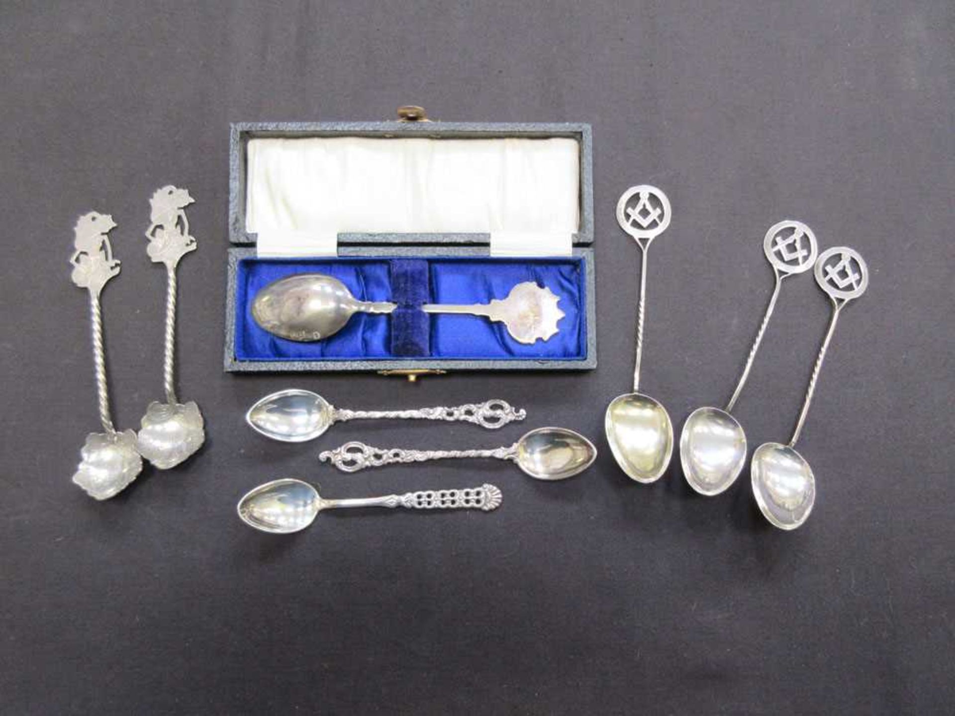 A selection of silver hallmarked and white metal spoons, one being marked 'Sterling Norway'