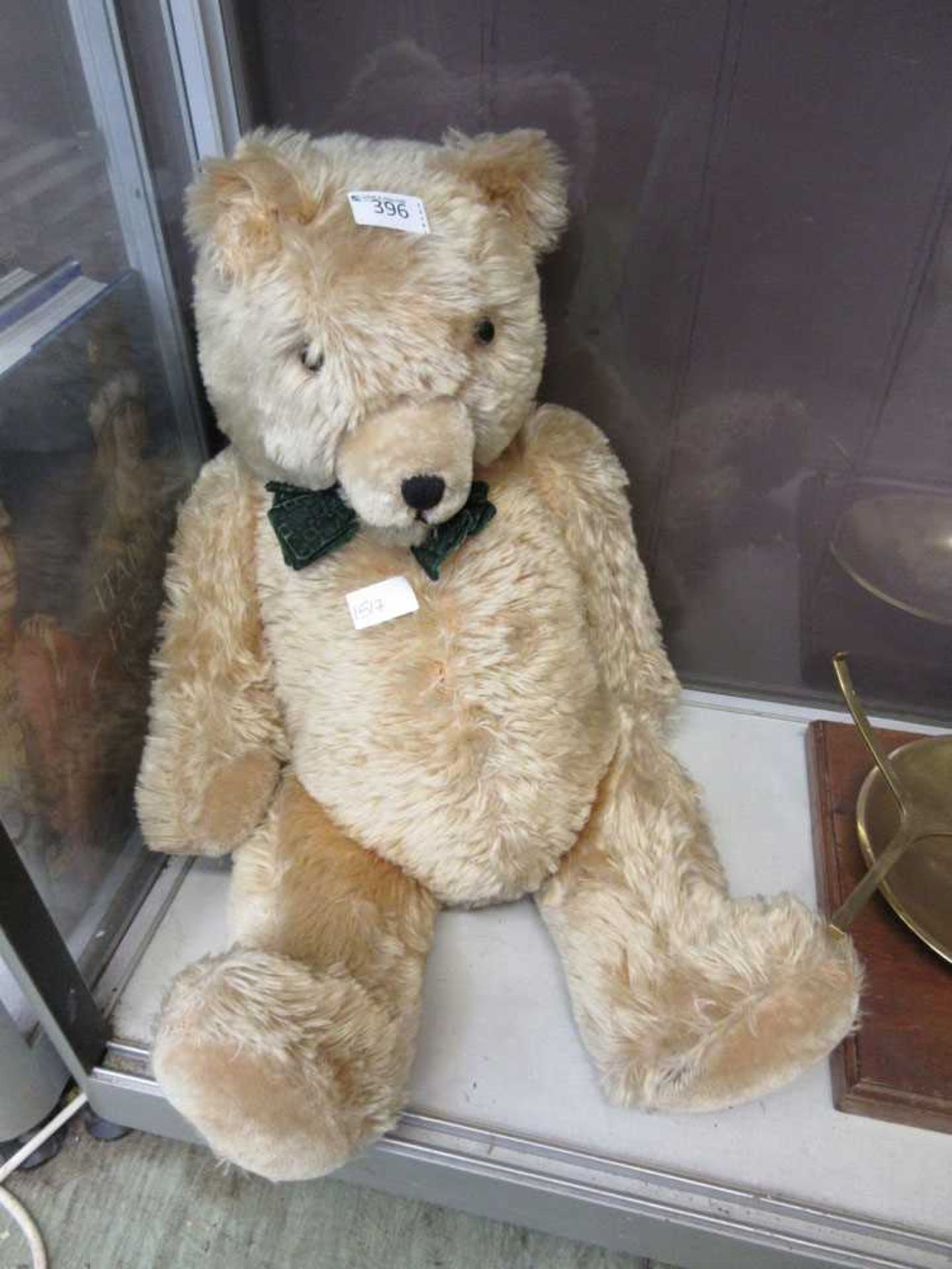 A 'Loveable' golden Police teddy bearLot is 66cm tall.