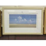 A framed and glazed limited edition medium photo lithograph of beach scene no.245/600 signed in