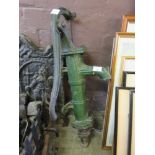 A cast iron green painted water pump