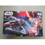 A boxed Star Wars Force Awakens Millennium Falcon model