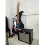 A Westfield electric guitar along with a Kustom amplifier
