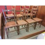 Four Edwardian cane seated bedroom chairs