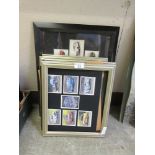 A collection of cigarette cards, some in frames, mainly of Ford cars