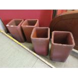 Four clay garden pots