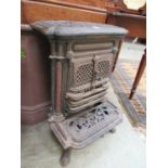 A cast iron wagon stove